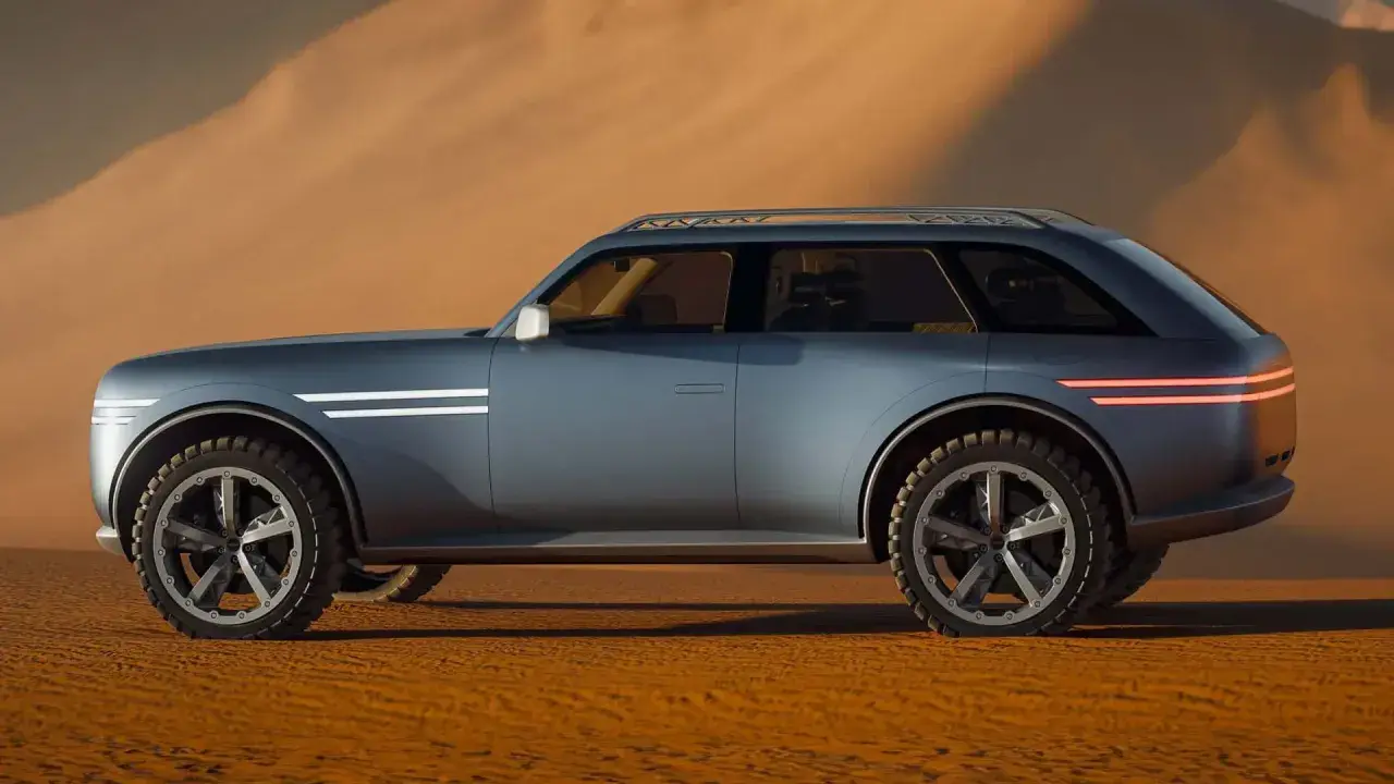 Ein futuristisches SUV der Automarke mit G, das durch eine Wüstenlandschaft fährt.